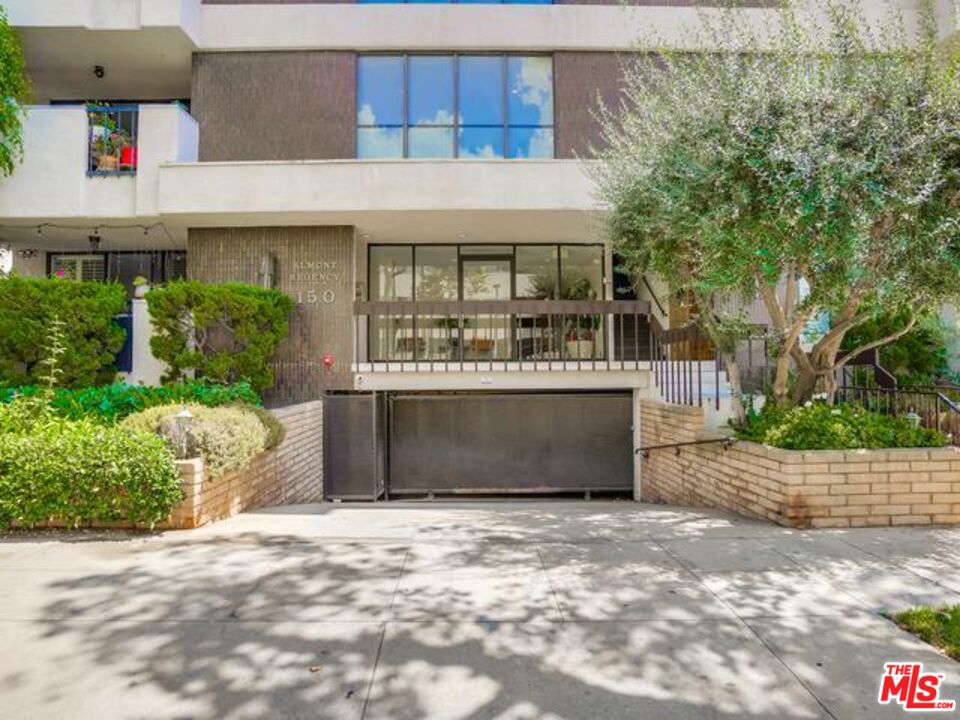 150 N Almont Dr Unit: 203