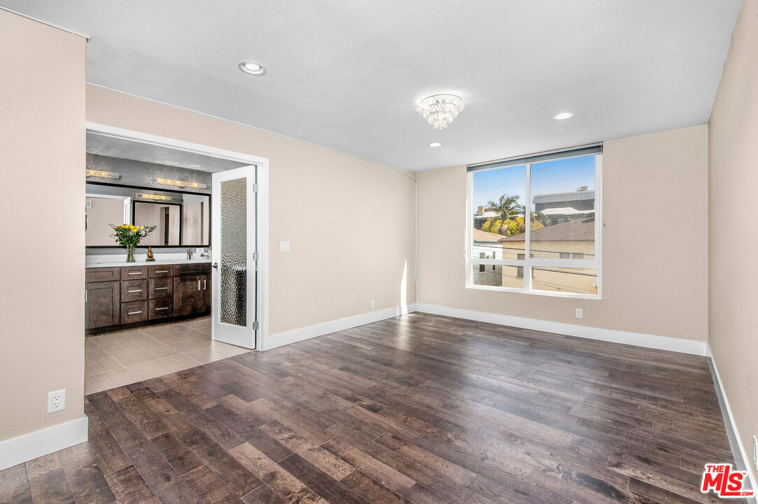 150 N Almont Dr Unit: 203