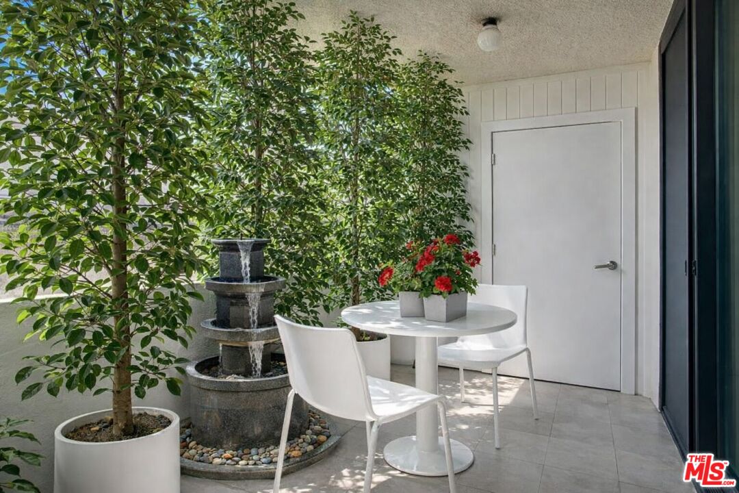 150 N Almont Dr Unit: 203