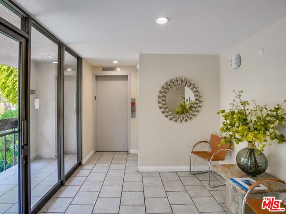 150 N Almont Dr Unit: 203