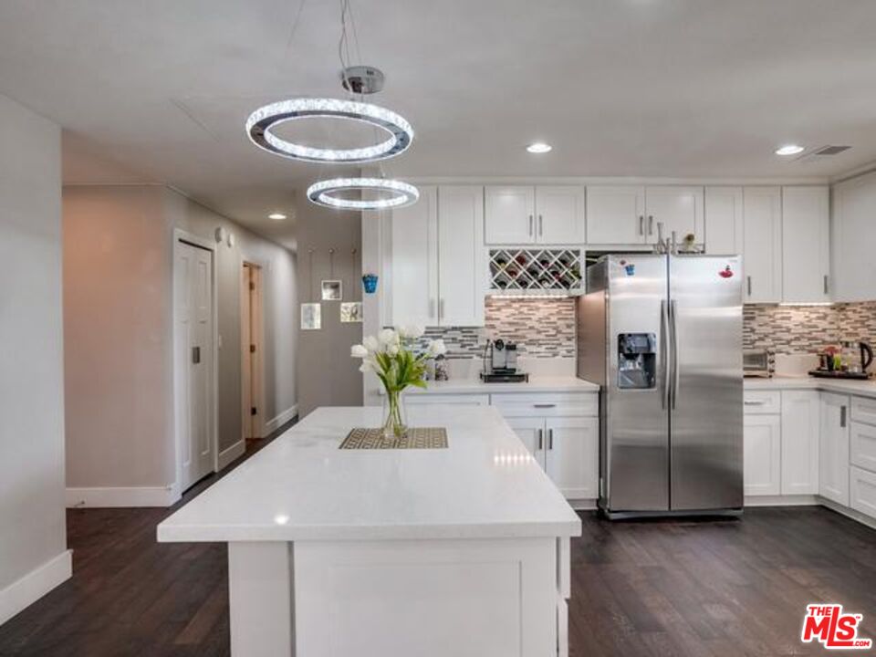 150 N Almont Dr Unit: 203