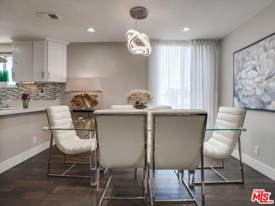 150 N Almont Dr Unit: 203