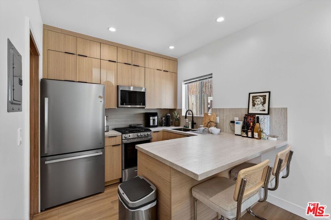 12023 Collins St