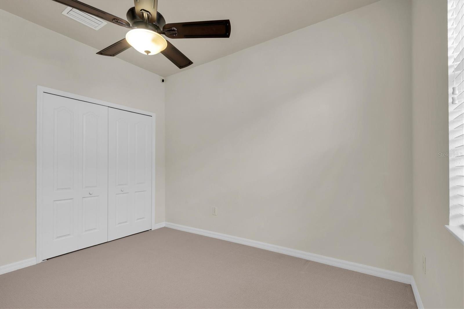 319 WHISPERING PALMS LN