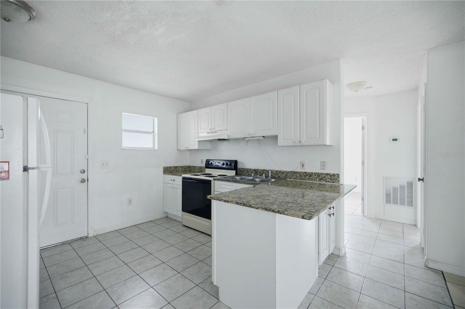 421 NE 26TH CT