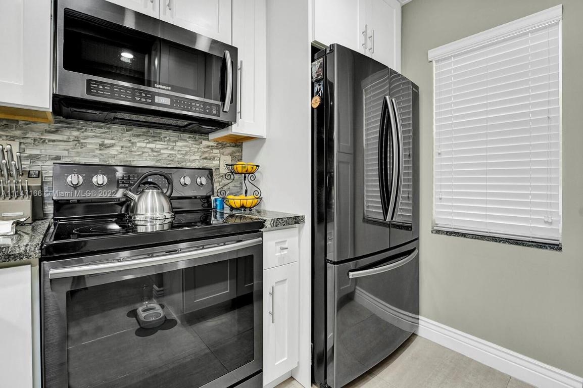 9845 Three Lakes Circle Circle 1-G