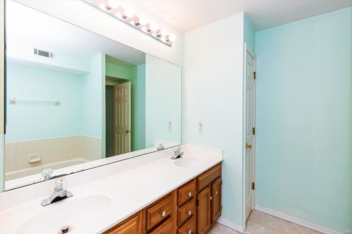 5106 Hollow Wood Court Unit: B