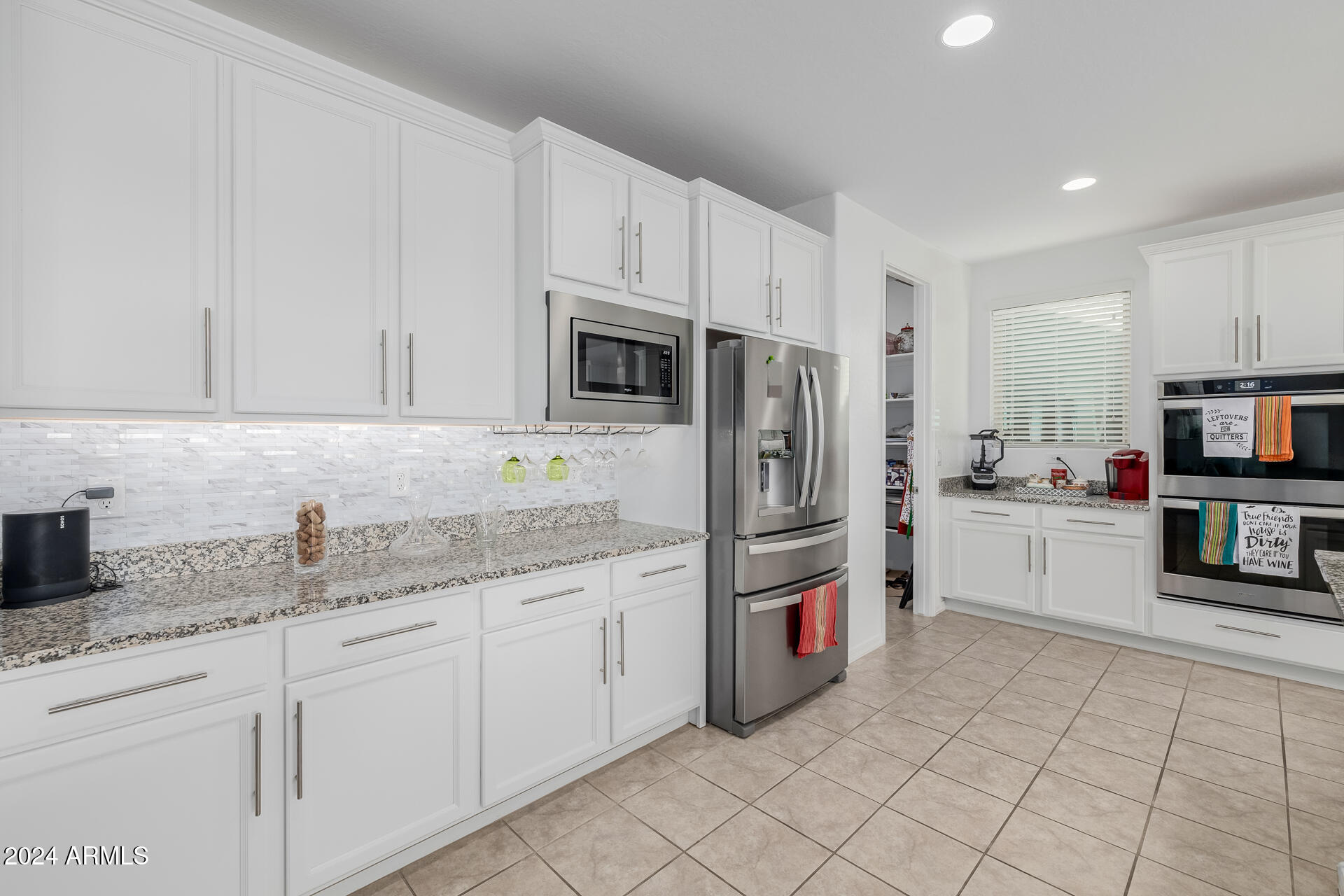 10707 E TESLA Avenue