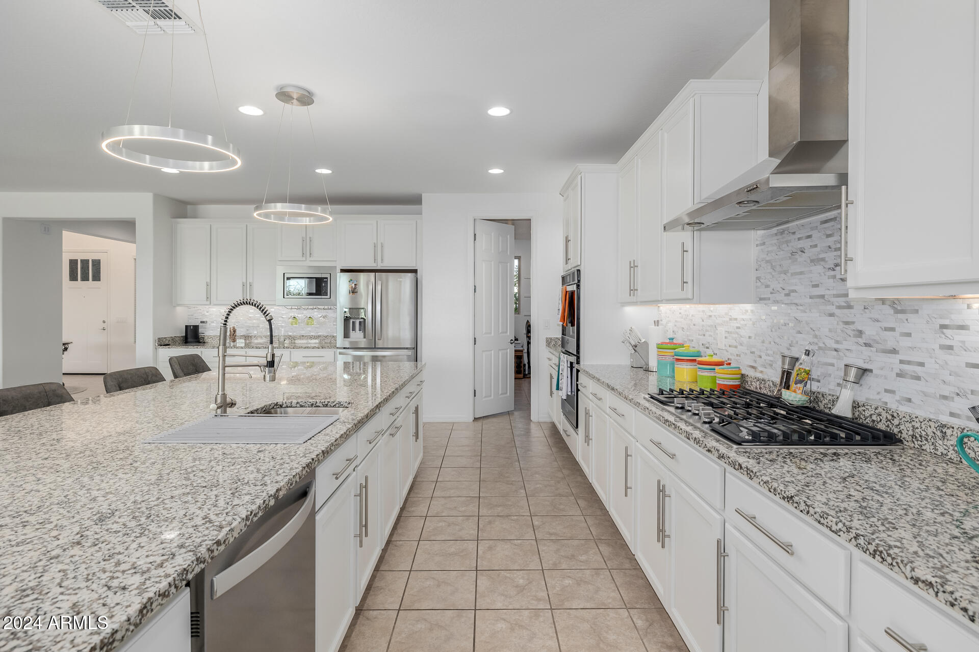 10707 E TESLA Avenue