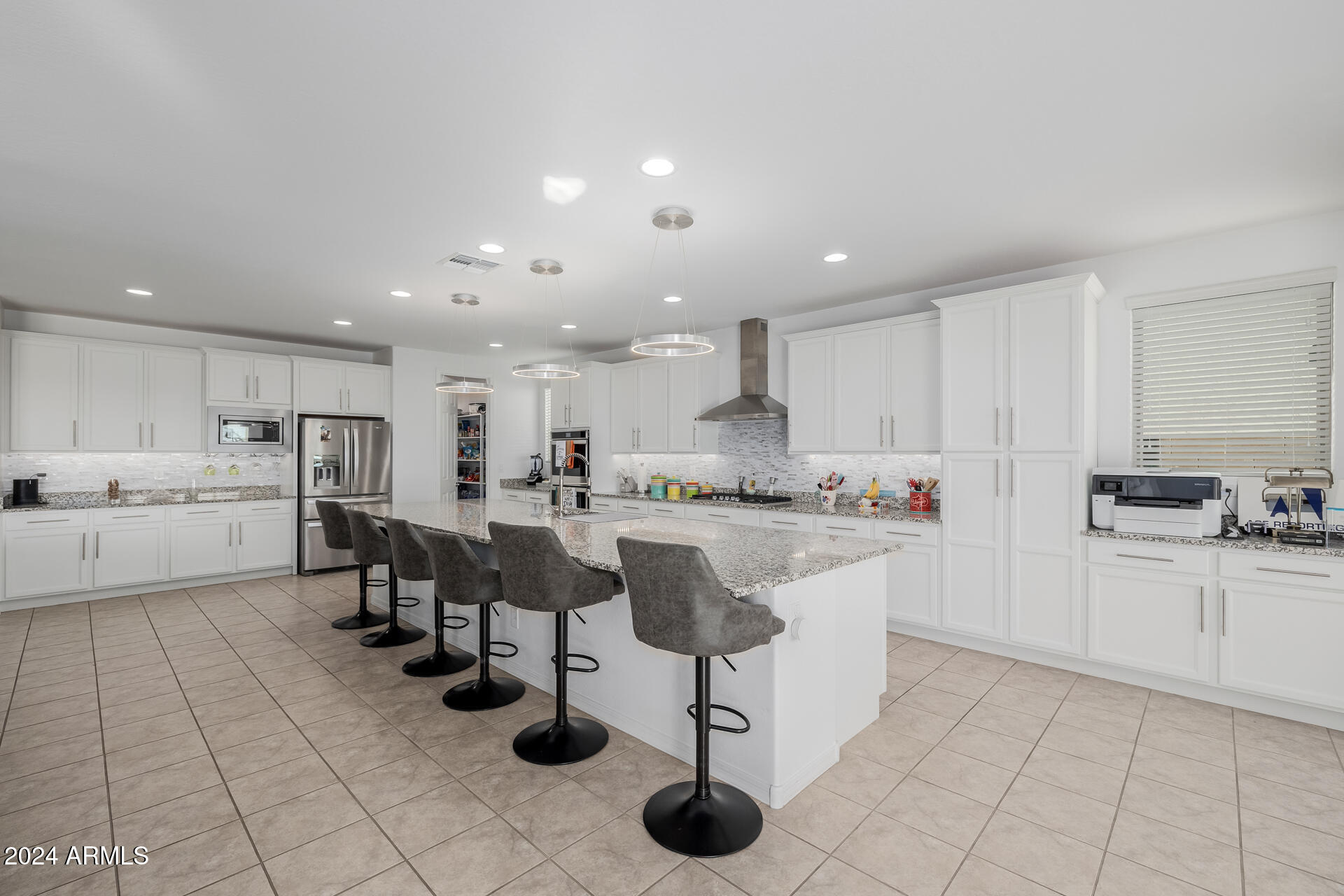 10707 E TESLA Avenue
