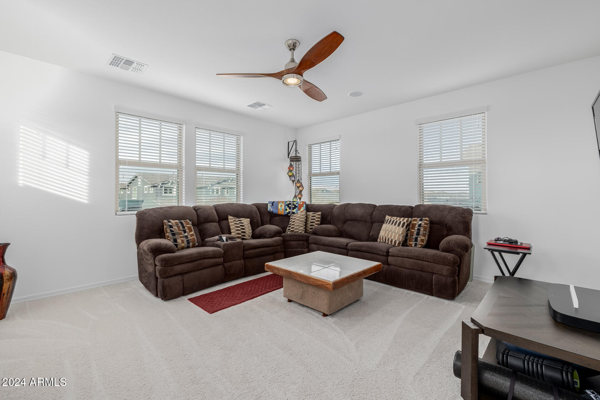 10707 E TESLA Avenue
