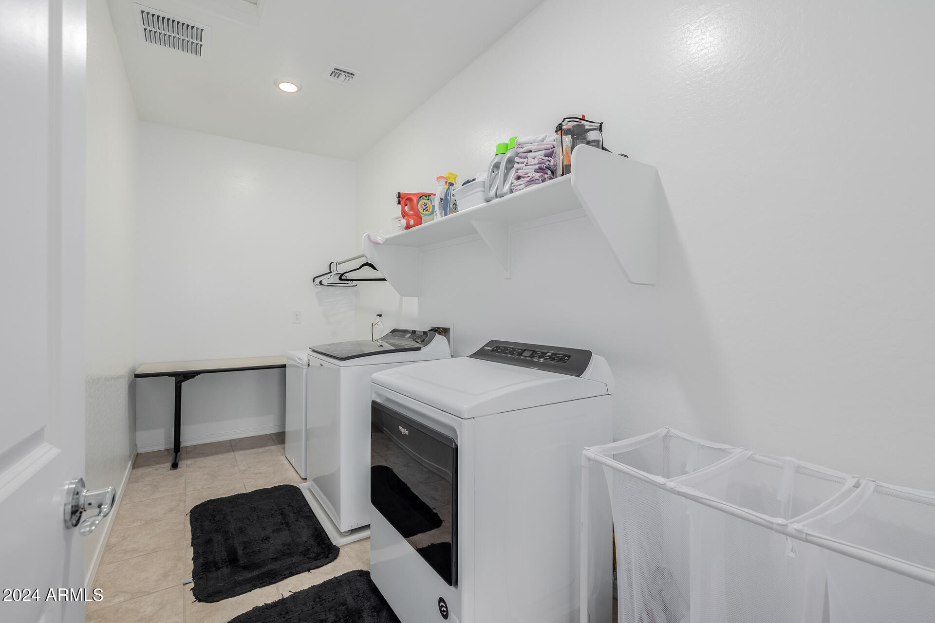 10707 E TESLA Avenue