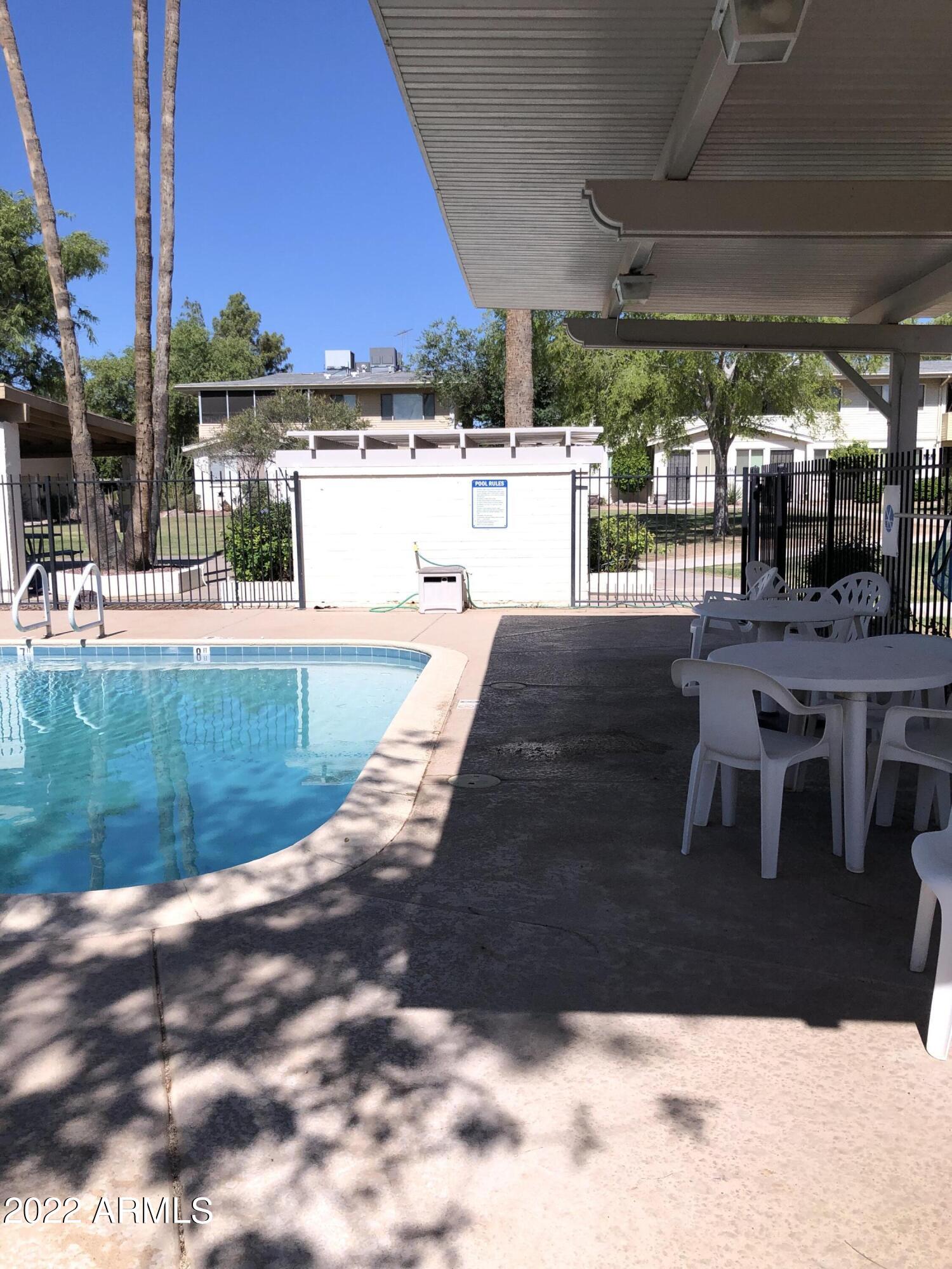 8211 E GARFIELD Street Unit: J13