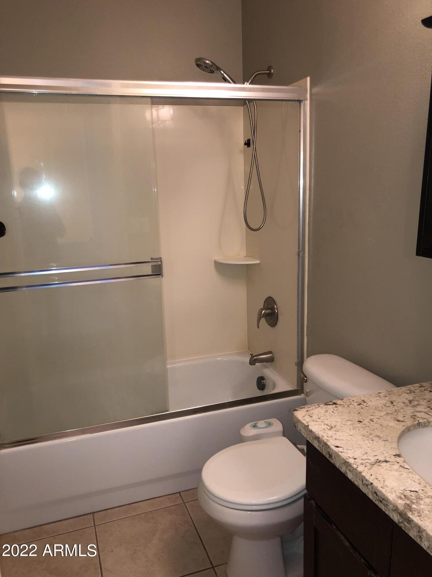 8211 E GARFIELD Street Unit: J13