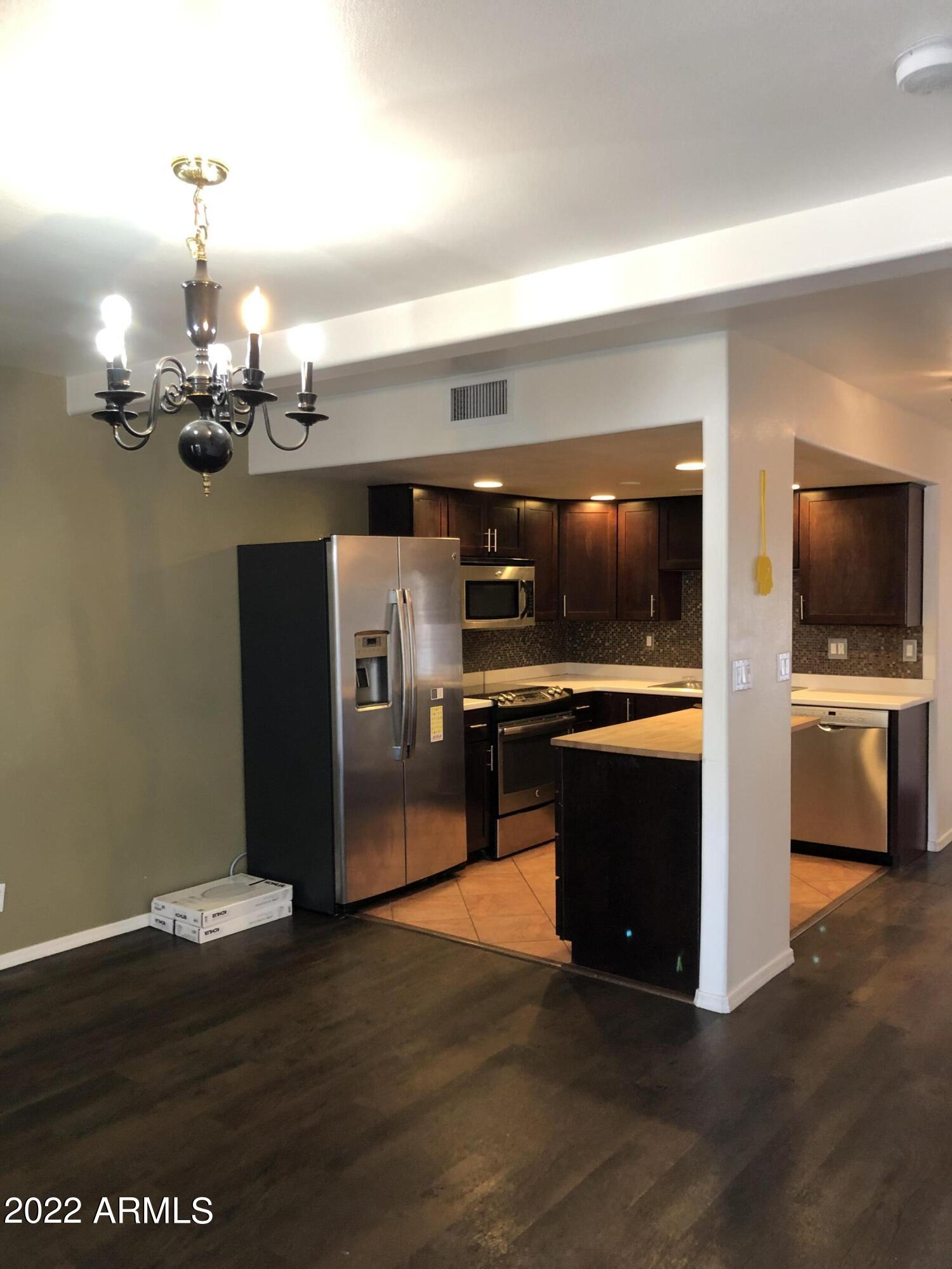 8211 E GARFIELD Street Unit: J13