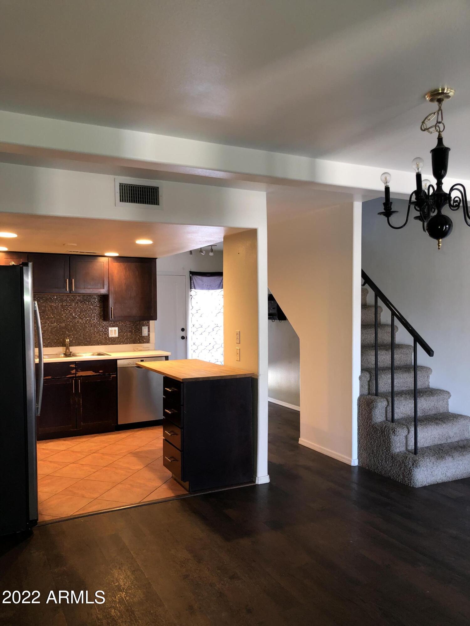 8211 E GARFIELD Street Unit: J13