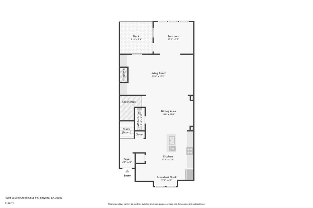 First-floor plan with a living room, kitchen, dining area, sunroom, deck, and breakfast nook.
