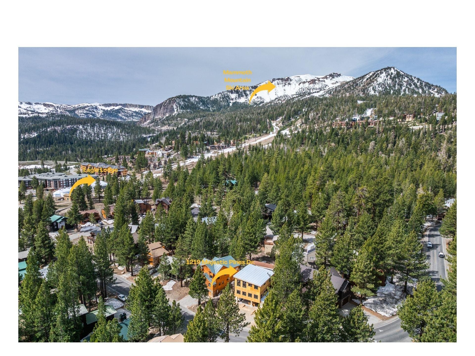 Aerial view of 1219 Majestic Pines Drive among pines, with Mammoth Mountain and Eagle Lodge marked.