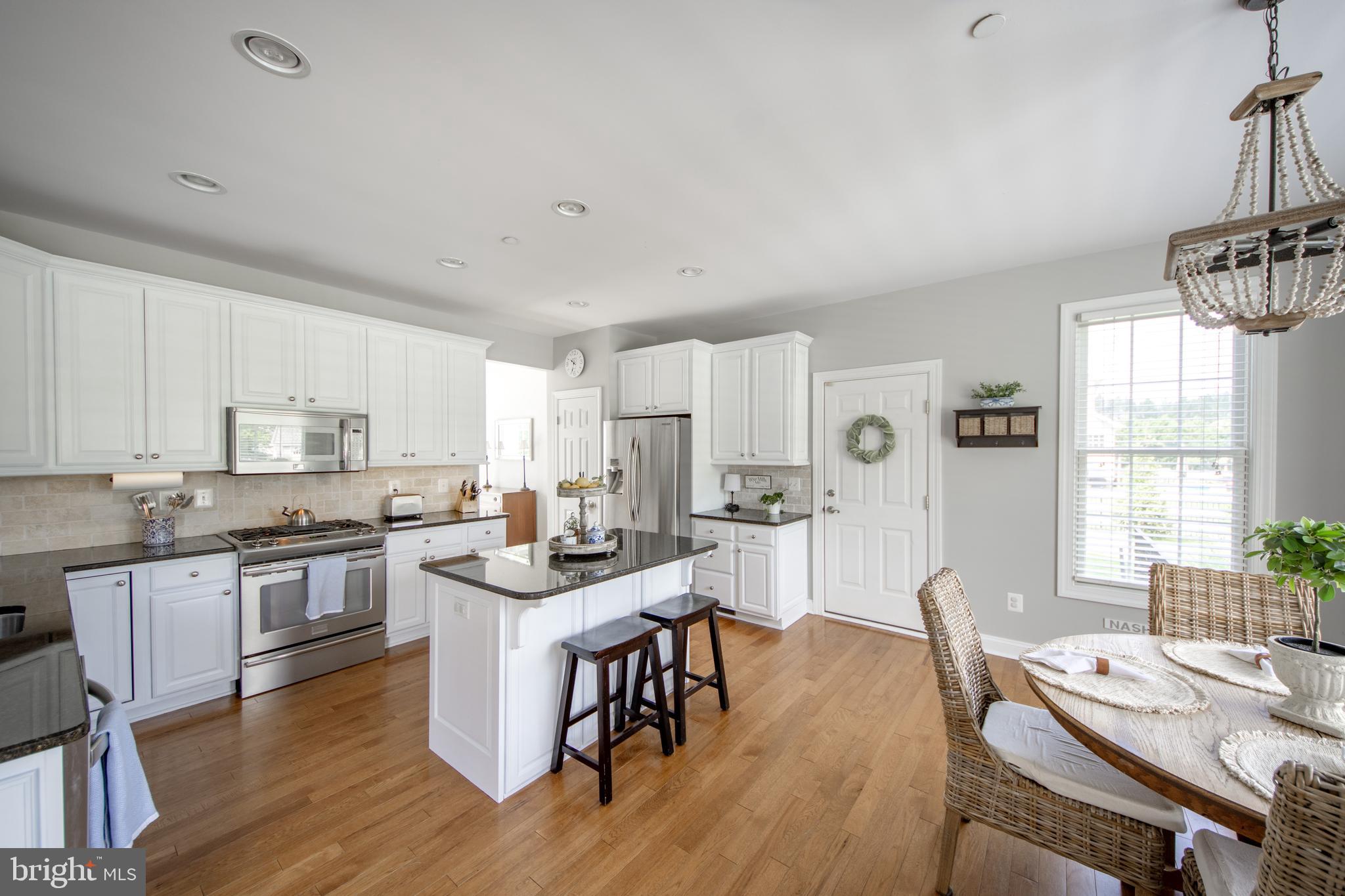 13474 RUSTLING OAKS DRIVE