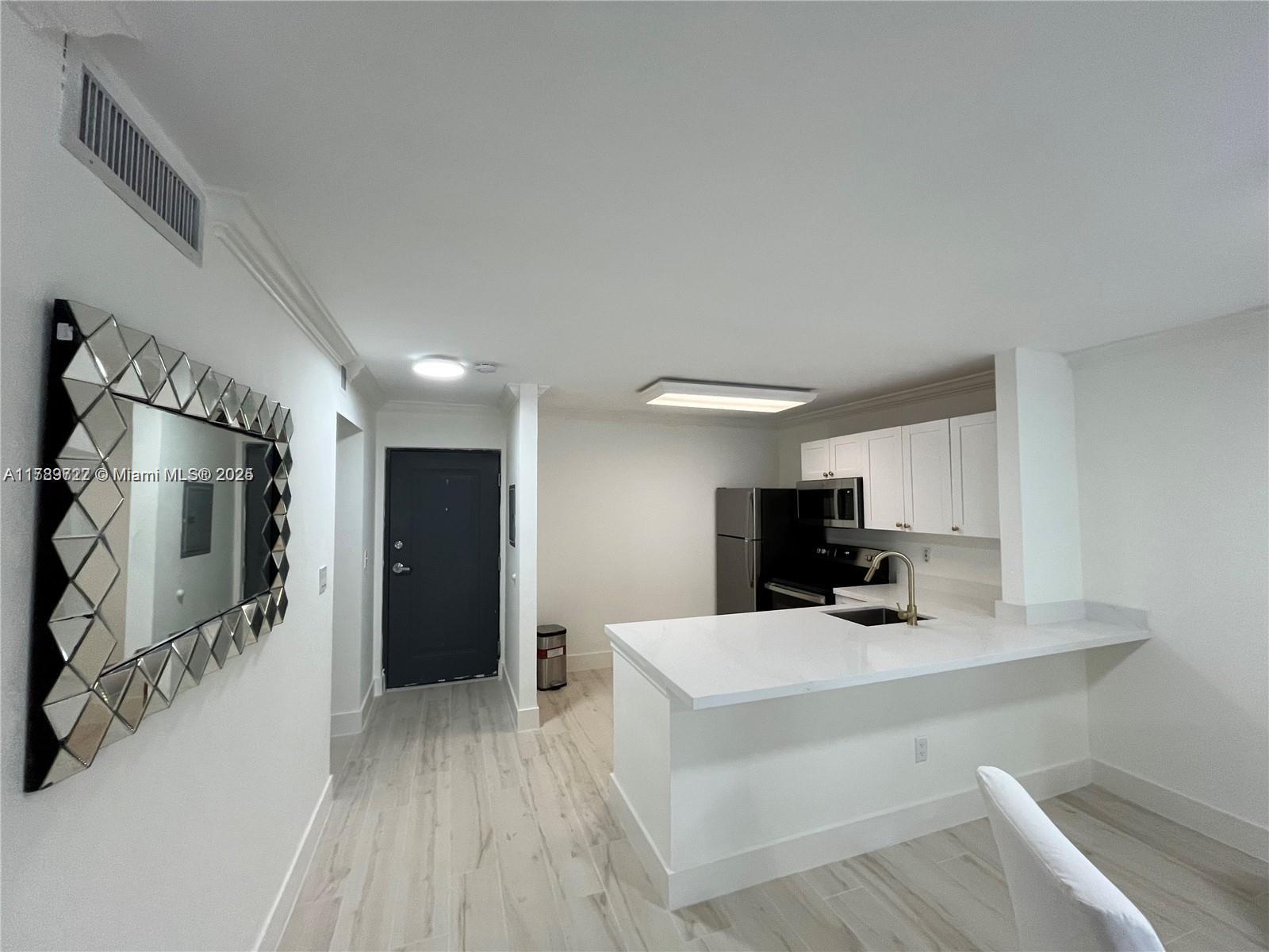 7820 Camino Real # 202 Unit: j-202