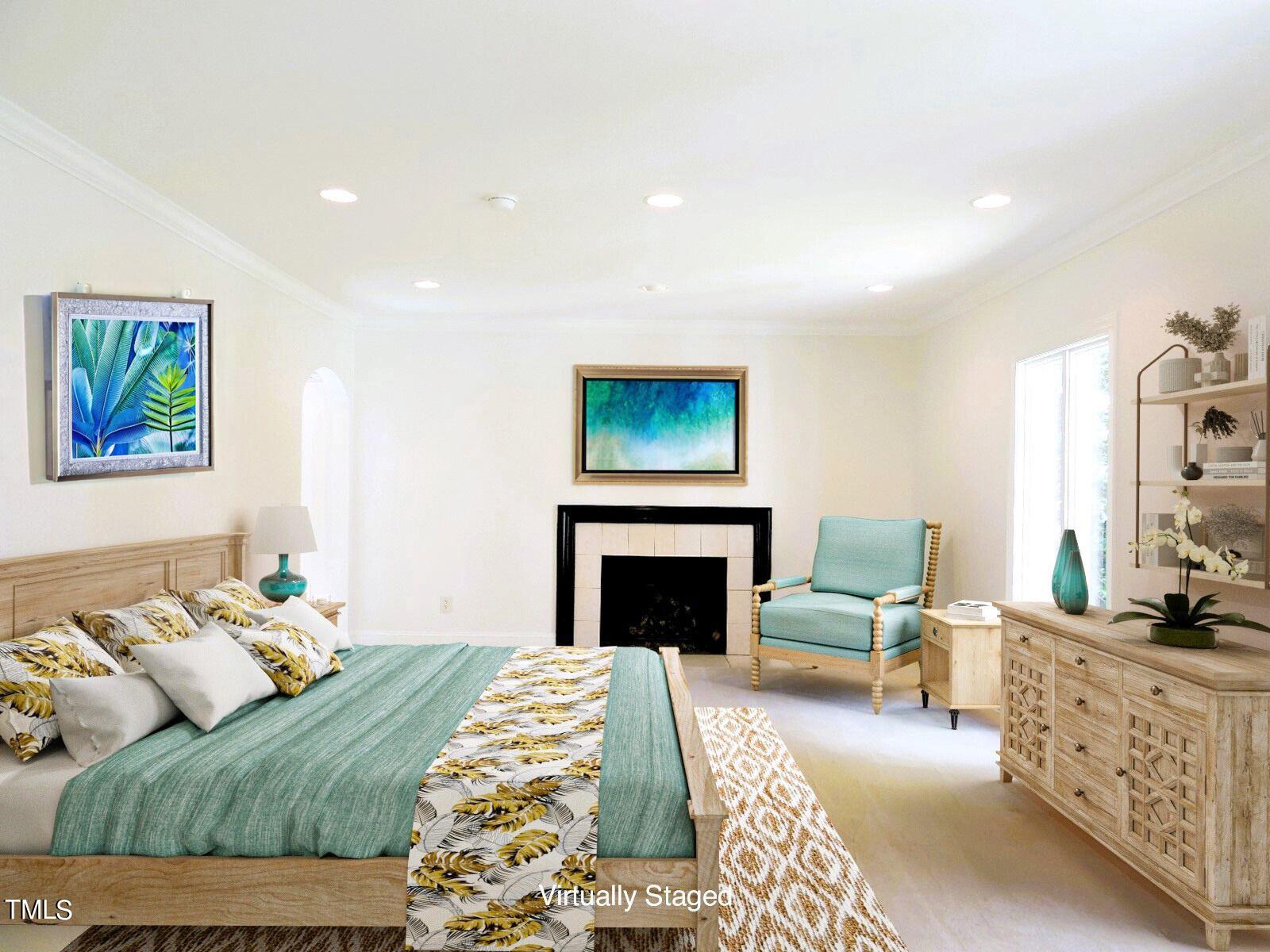 Virtually staged bedroom with a teal-covered bed, fireplace, and aqua chair.