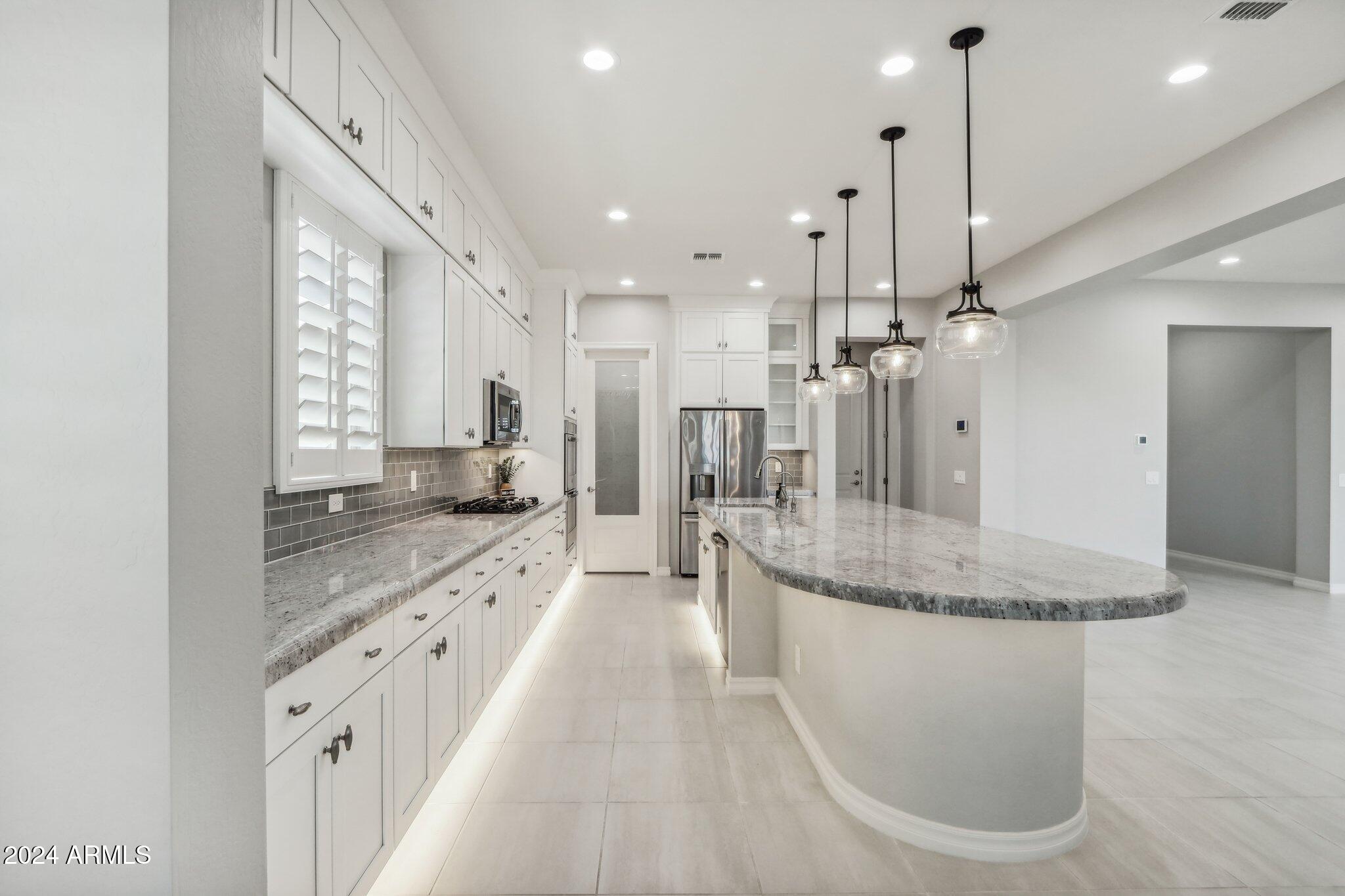 4448 E SKOUSEN Street