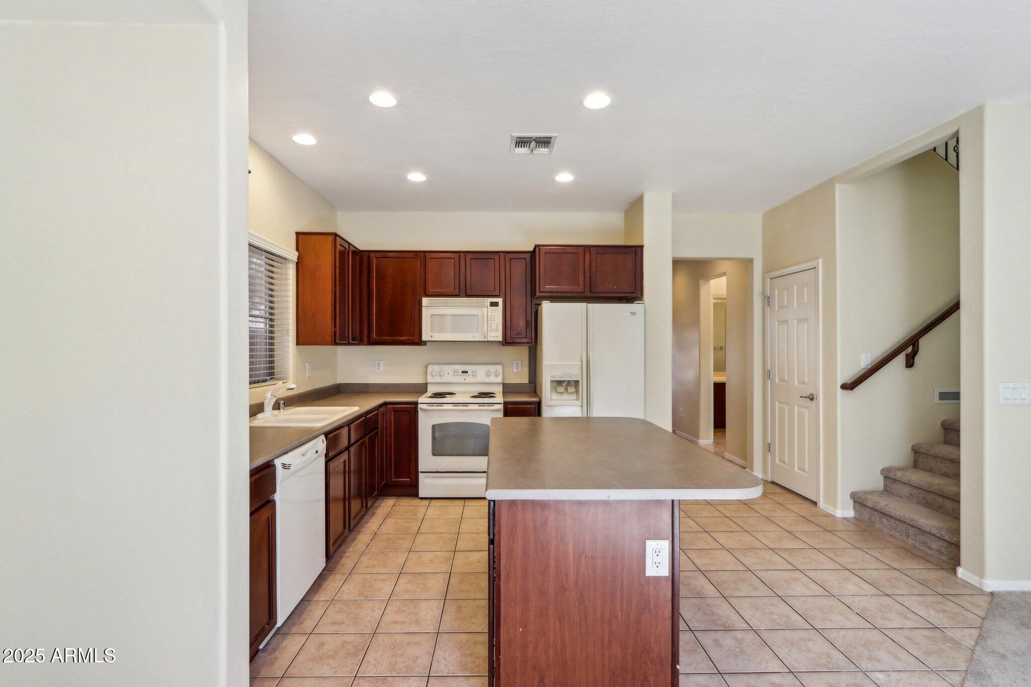 14169 W Country Gables Drive