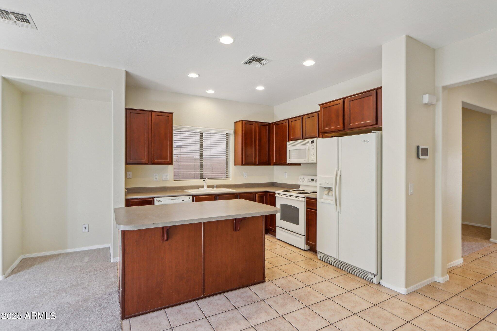 14169 W Country Gables Drive