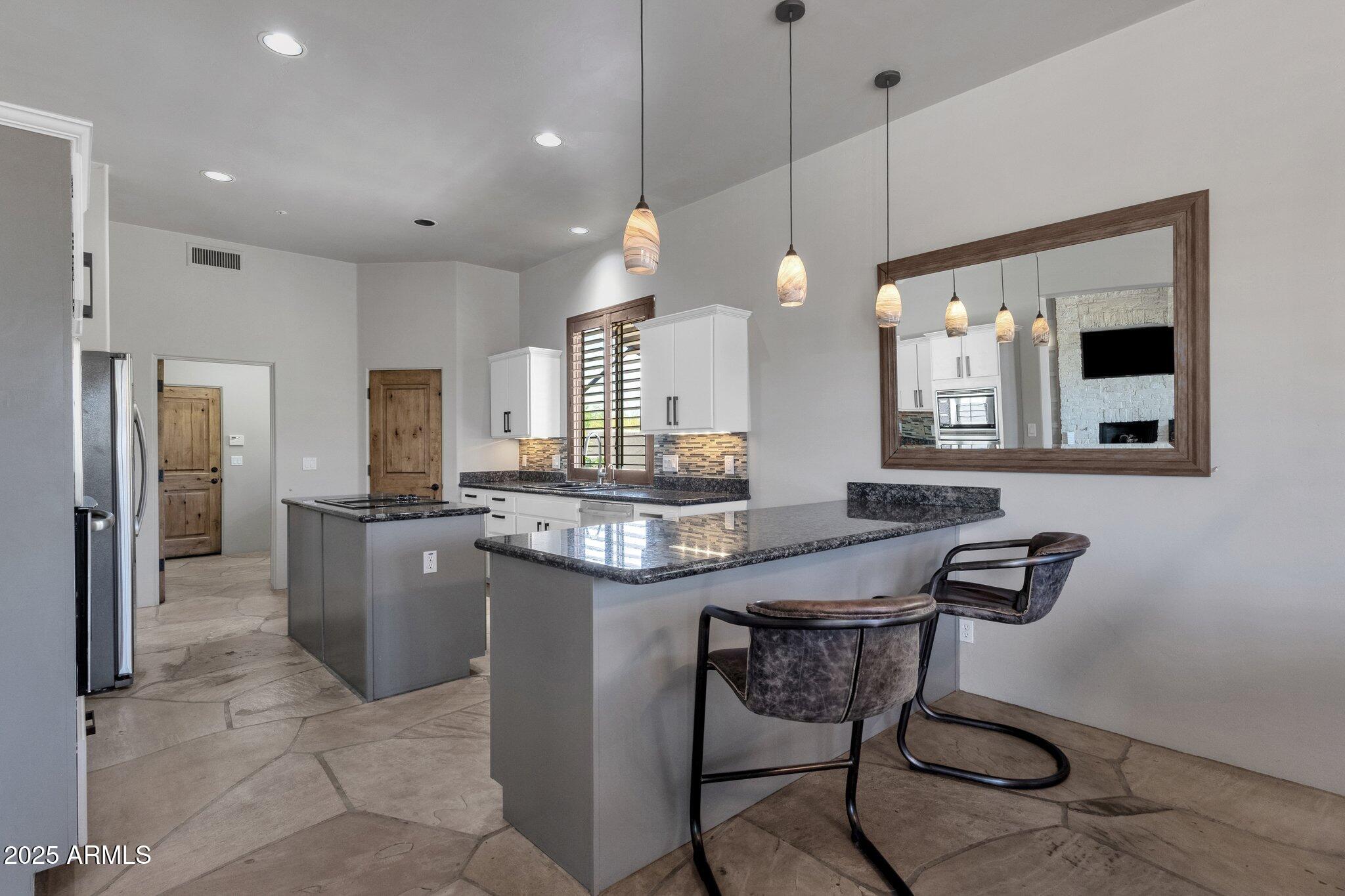 11123 E MONUMENT Drive