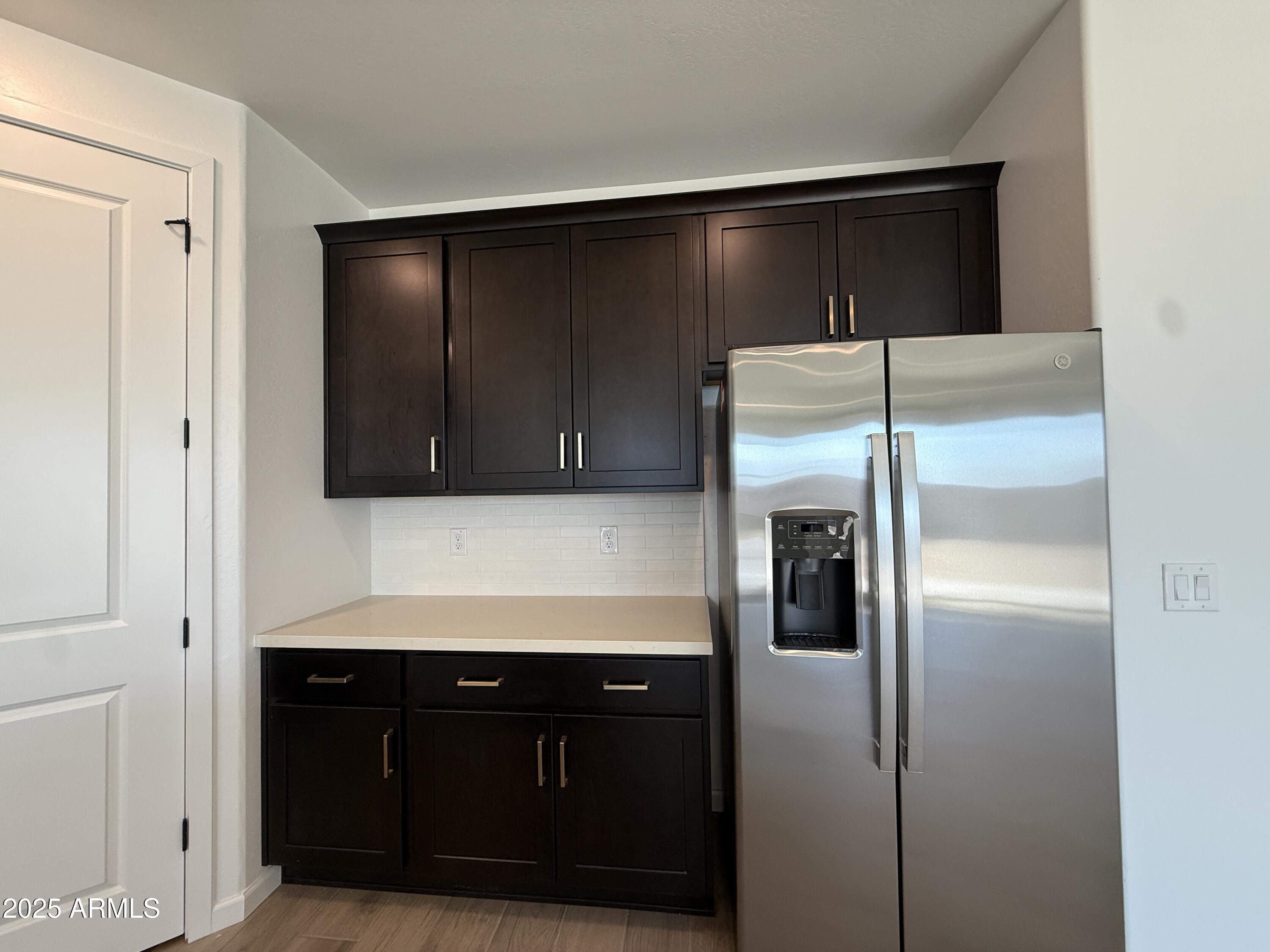 9619 W TAMARISK Avenue