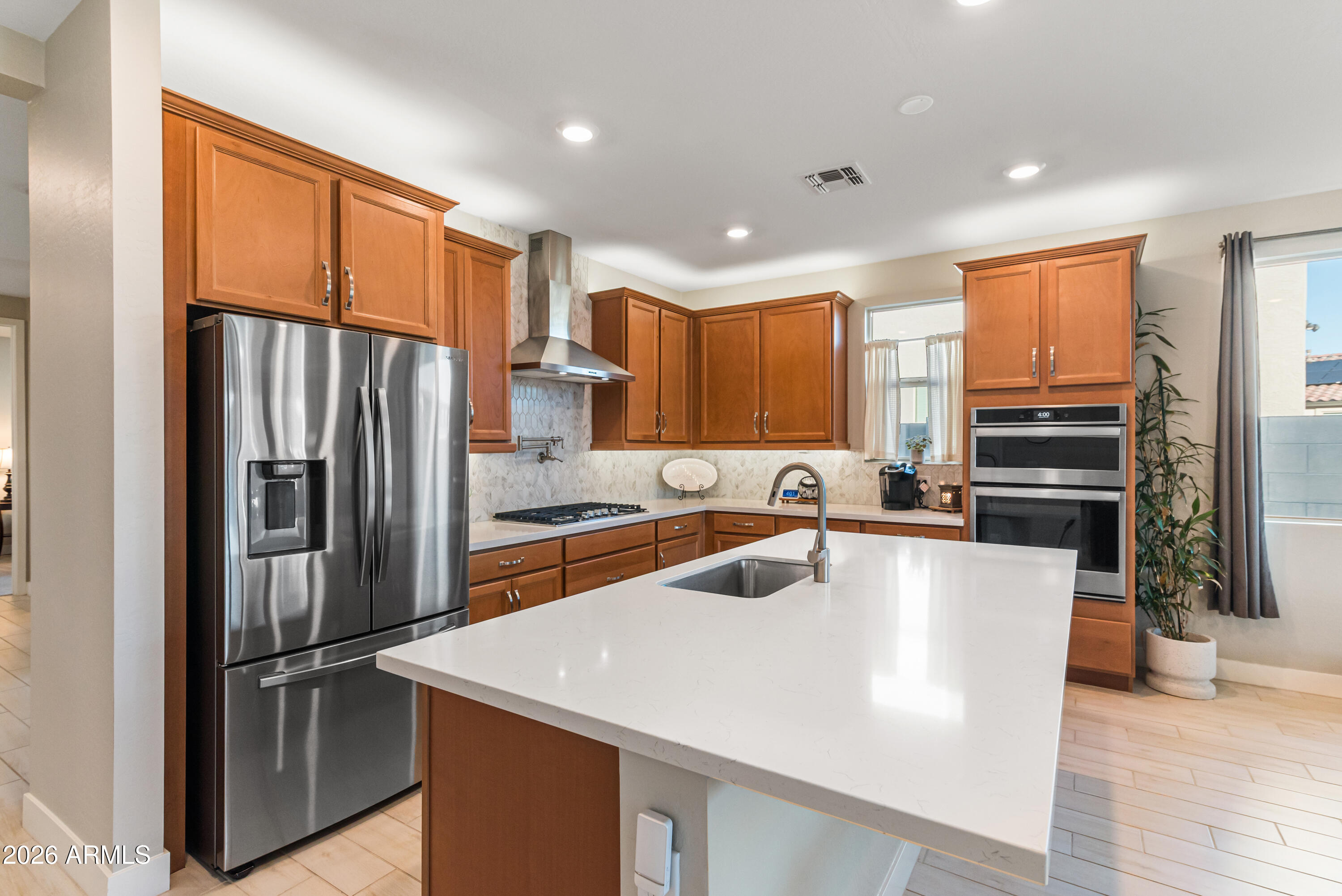 11675 W MARGUERITE Avenue