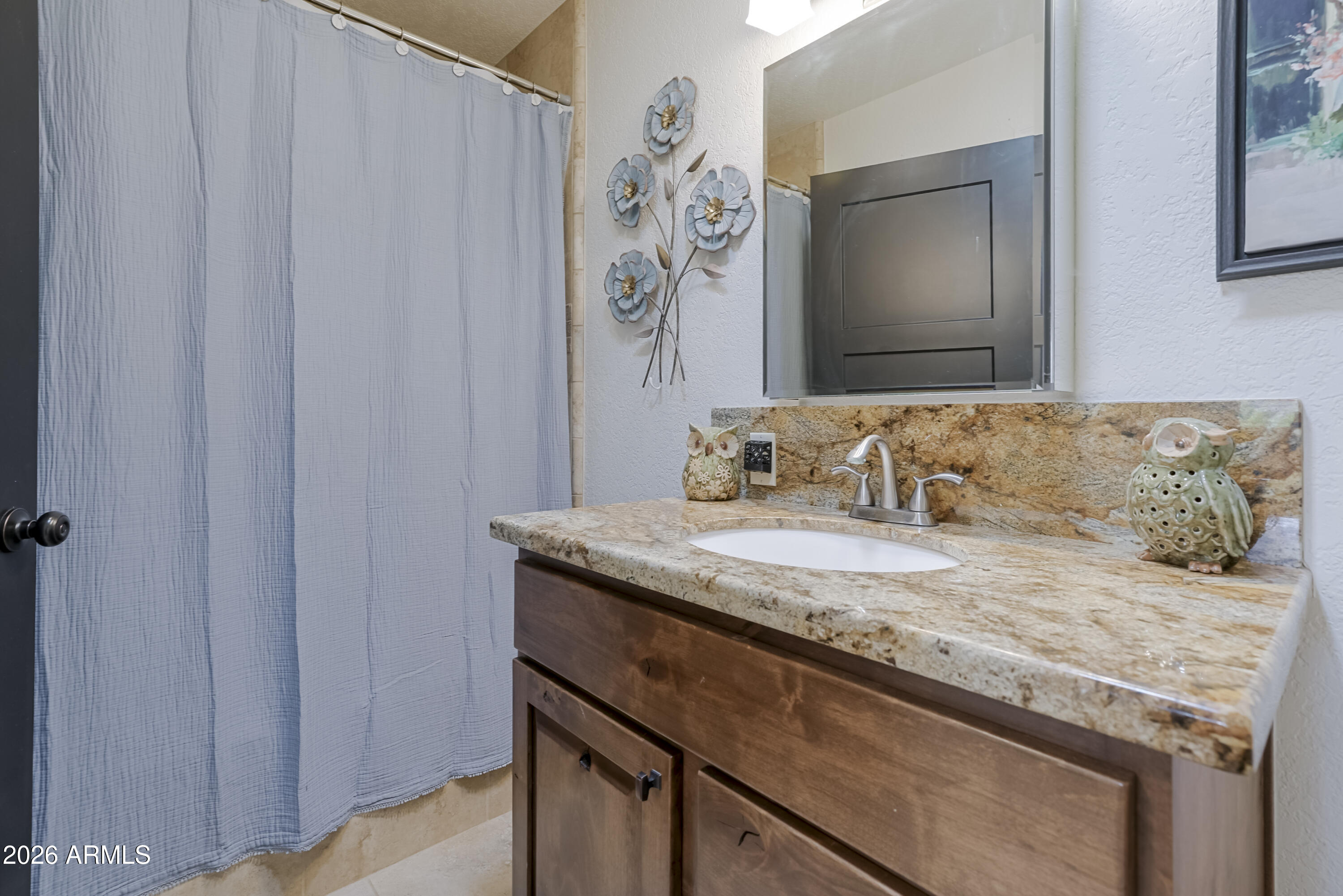 10640 E WILLOW Drive