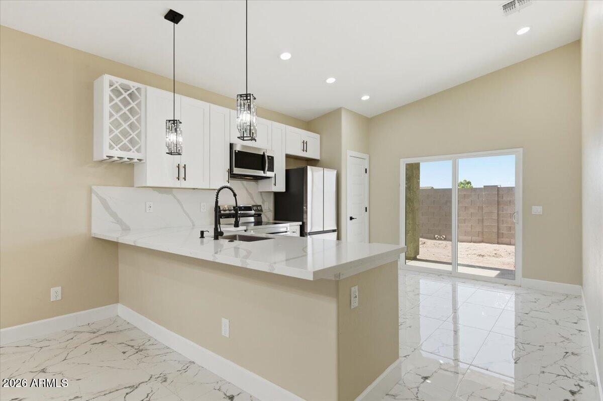9889 W Heather Drive