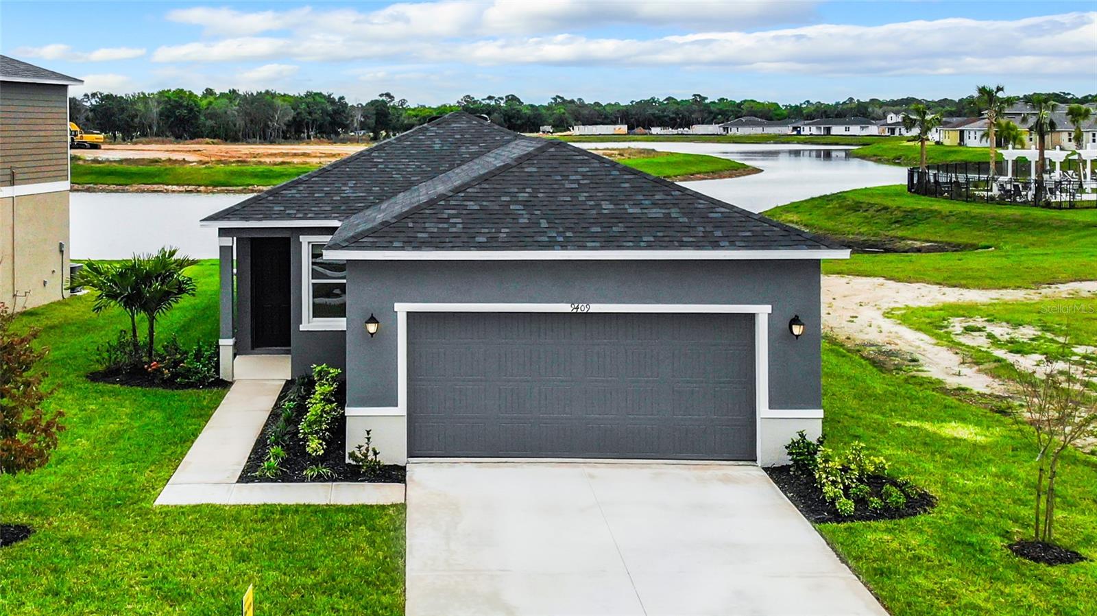 9409 SANDY BLUFFS CIR