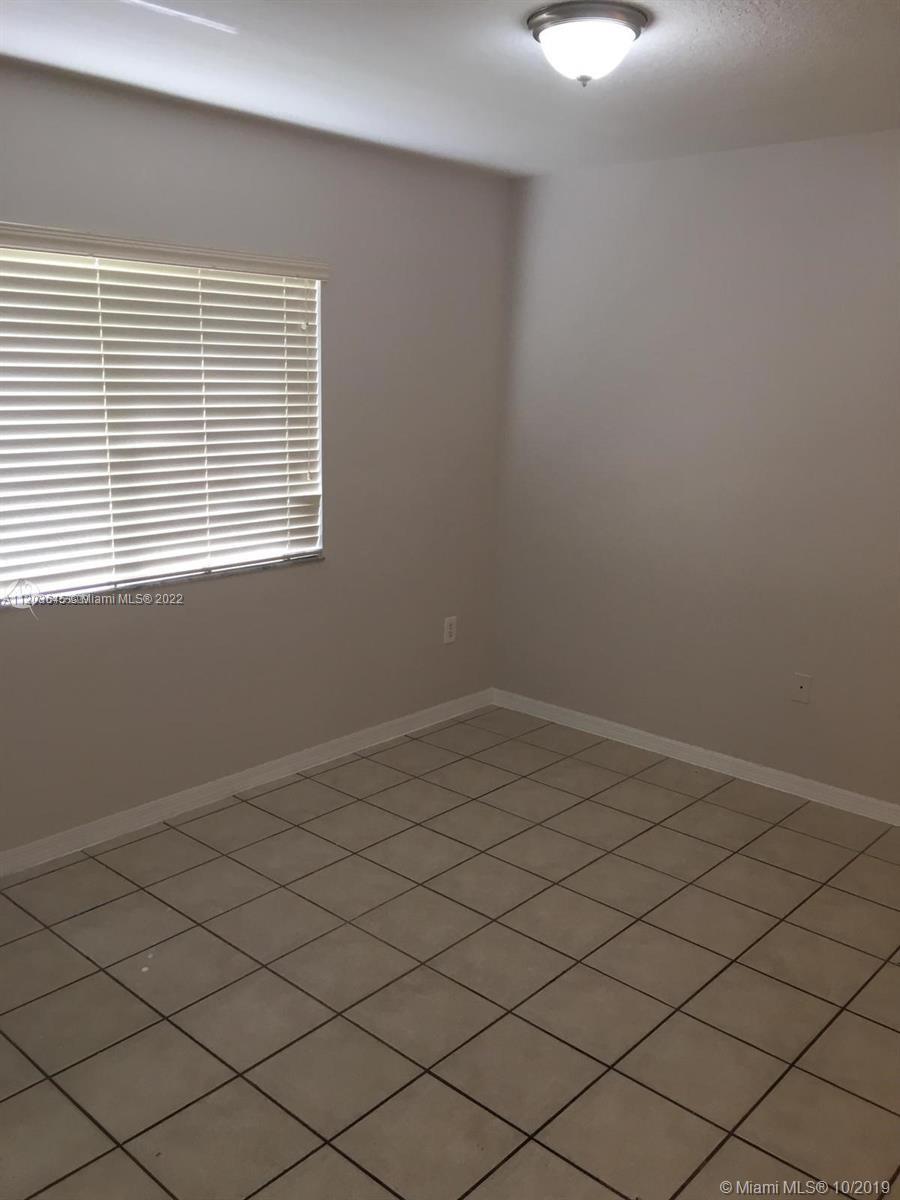 3398 NE 9 DR Unit: 102