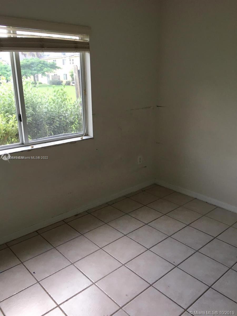 3398 NE 9 DR Unit: 102