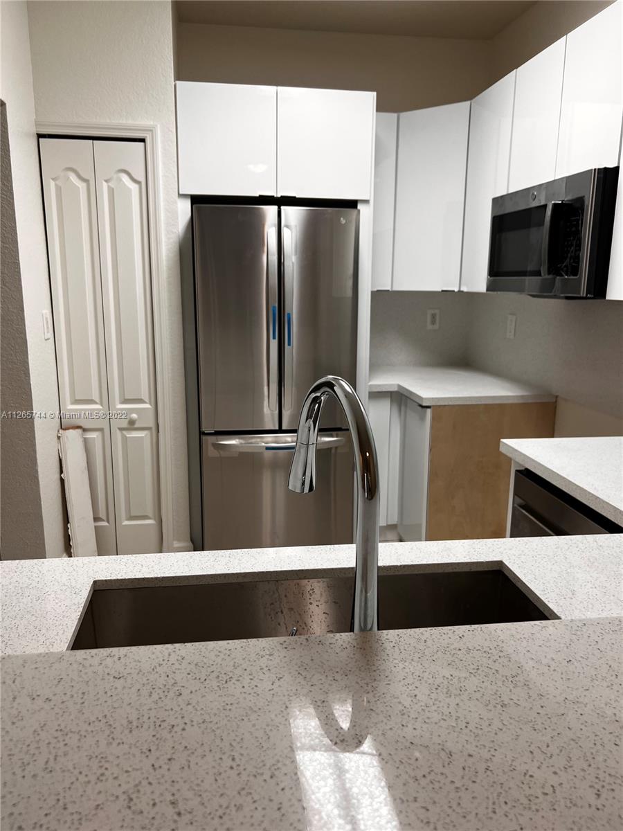 17800 NW 73rd Ave Unit: 104-21