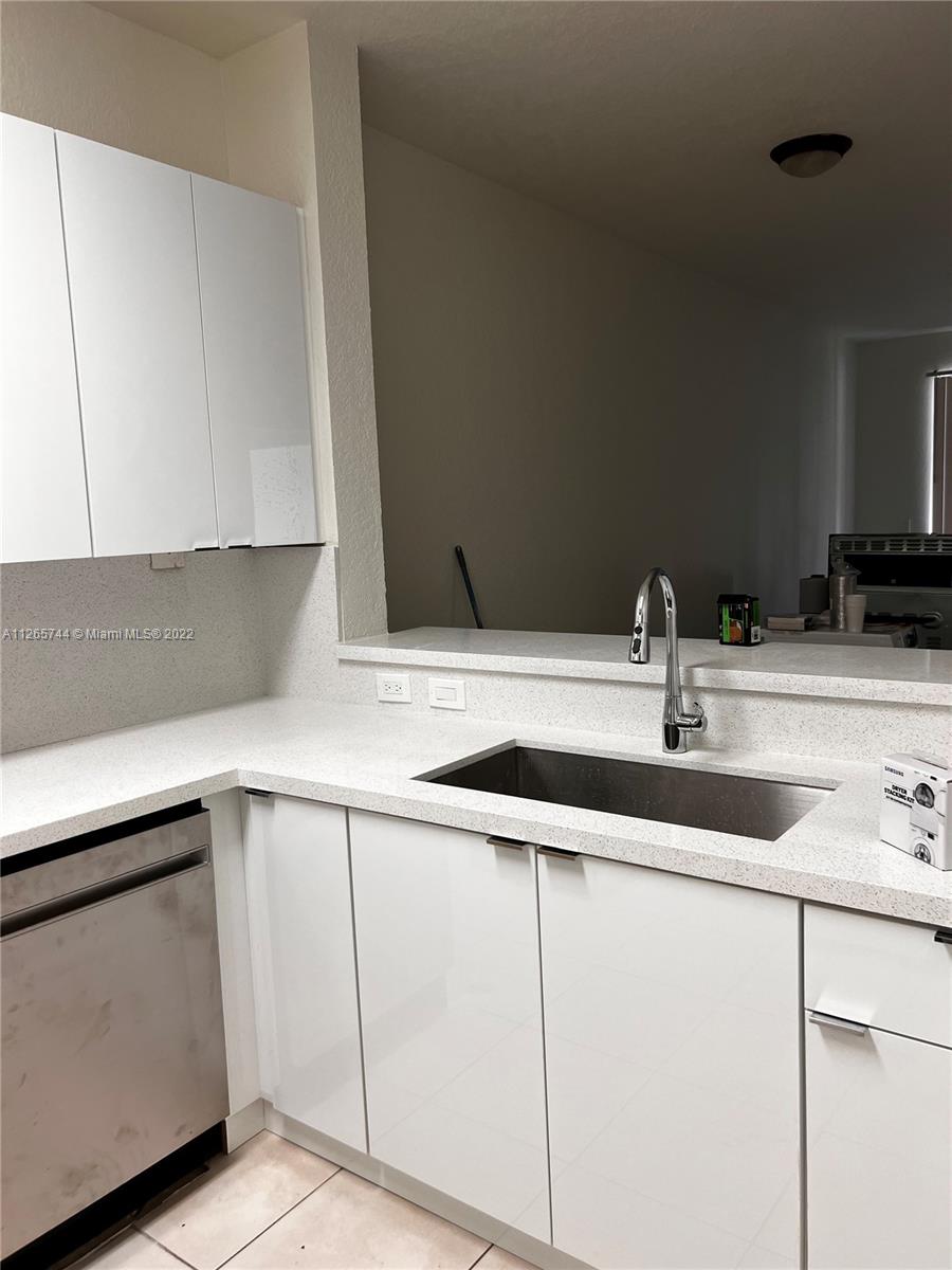 17800 NW 73rd Ave Unit: 104-21