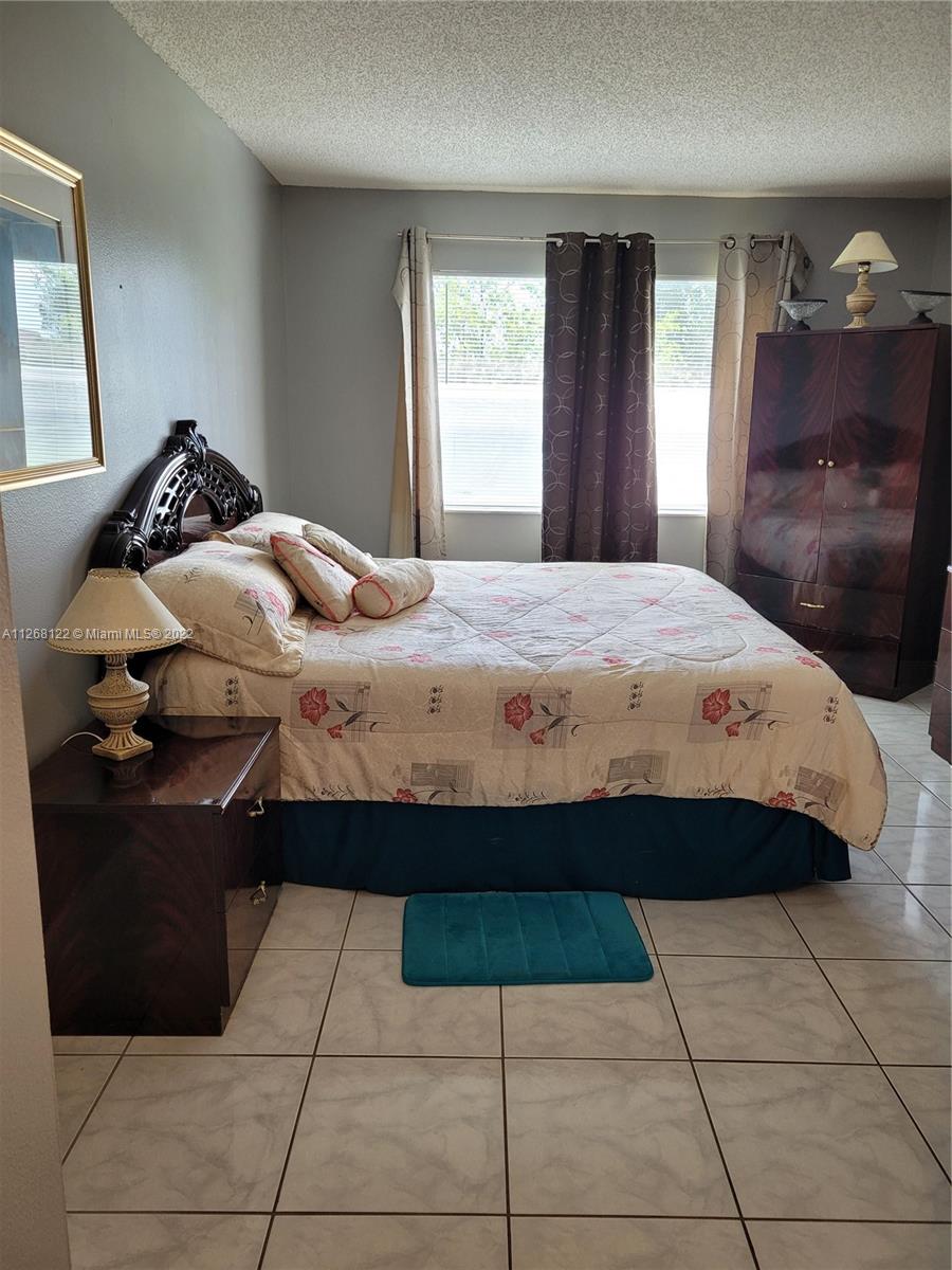 9801 SUNRISE LAKES Unit: 211