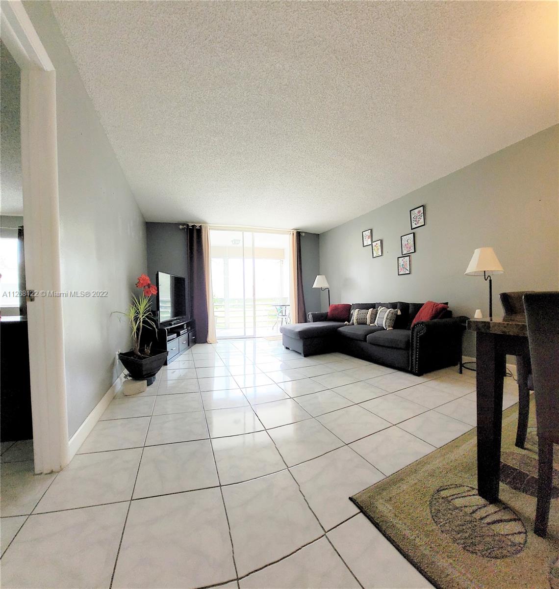 9801 SUNRISE LAKES Unit: 211