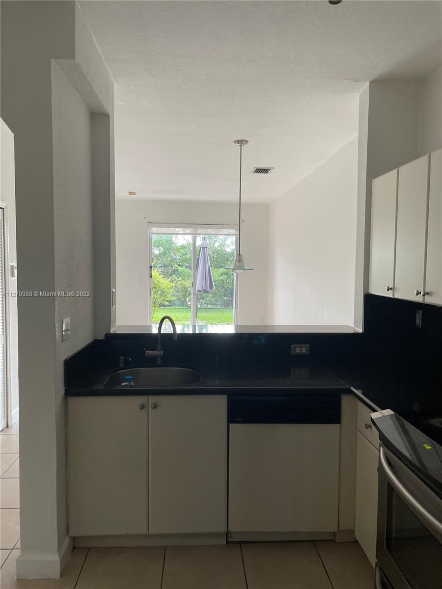 17630 NW 73rd Ave Unit: 102-4