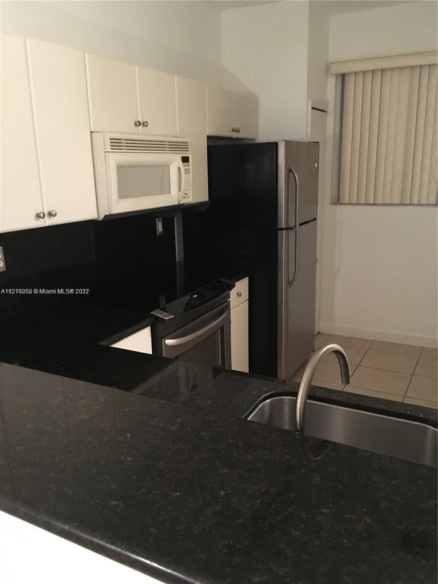 17630 NW 73rd Ave Unit: 102-4