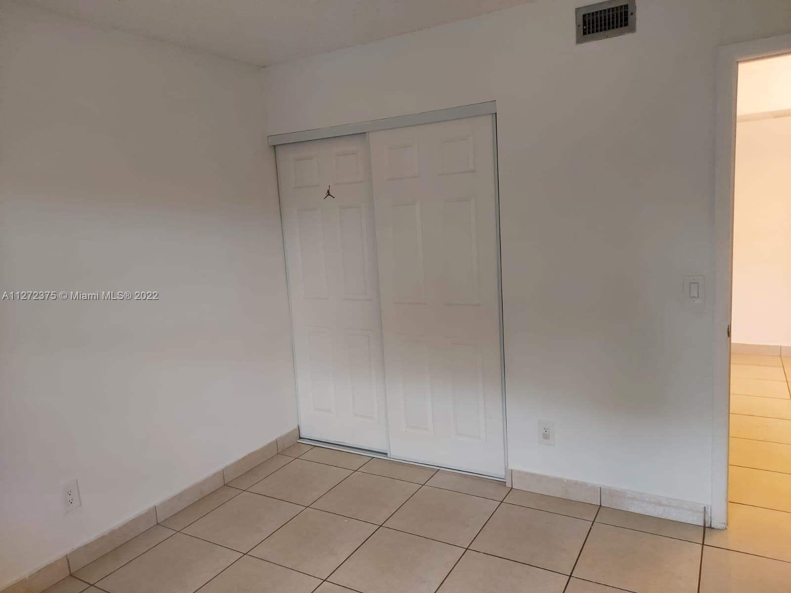 10445 NW 7th St Unit: 104