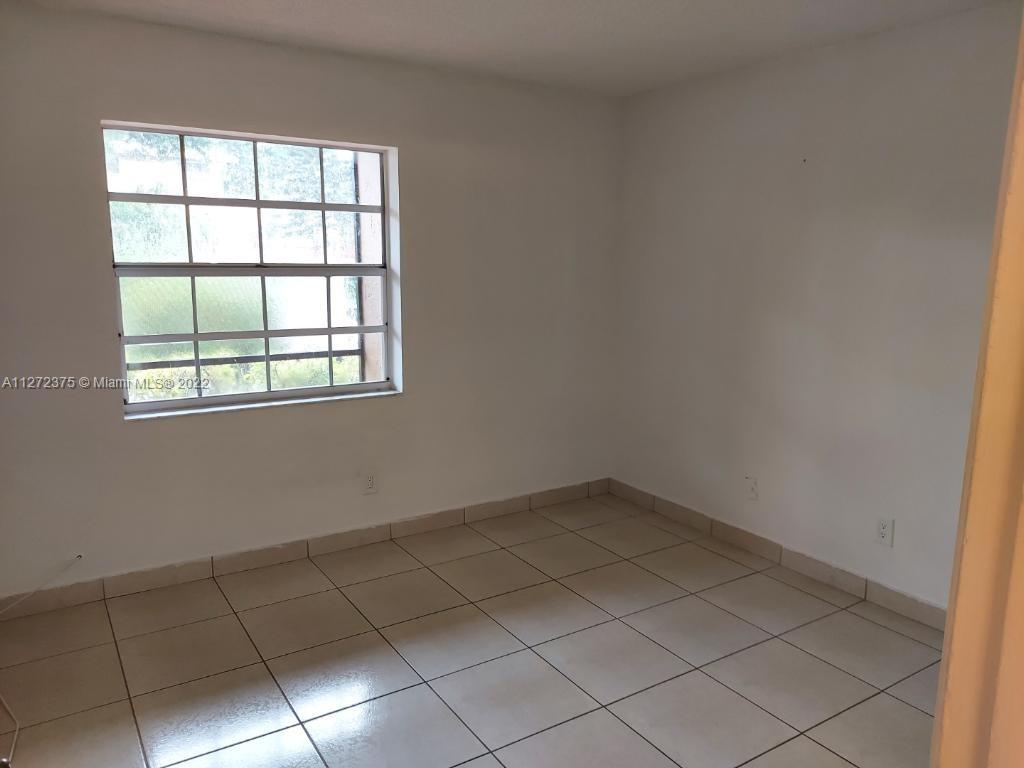 10445 NW 7th St Unit: 104