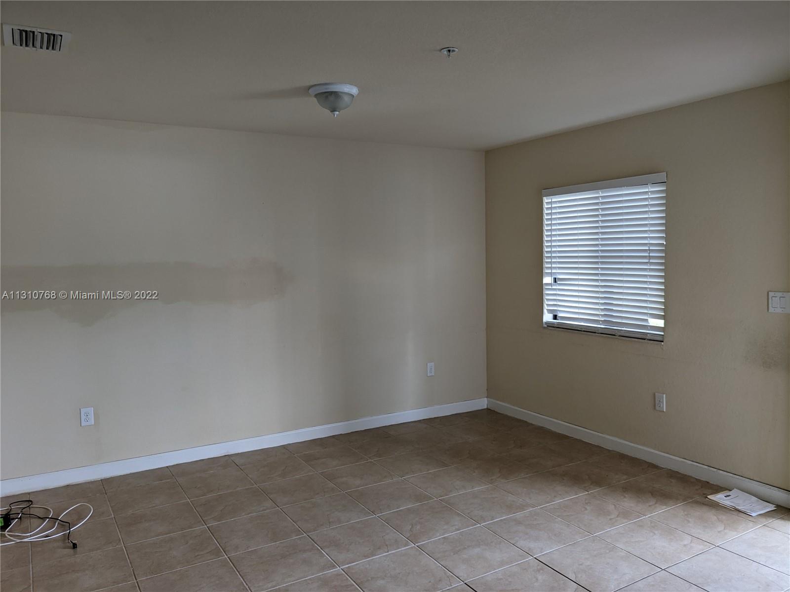 22411 SW 88th Pl Unit: 9-26