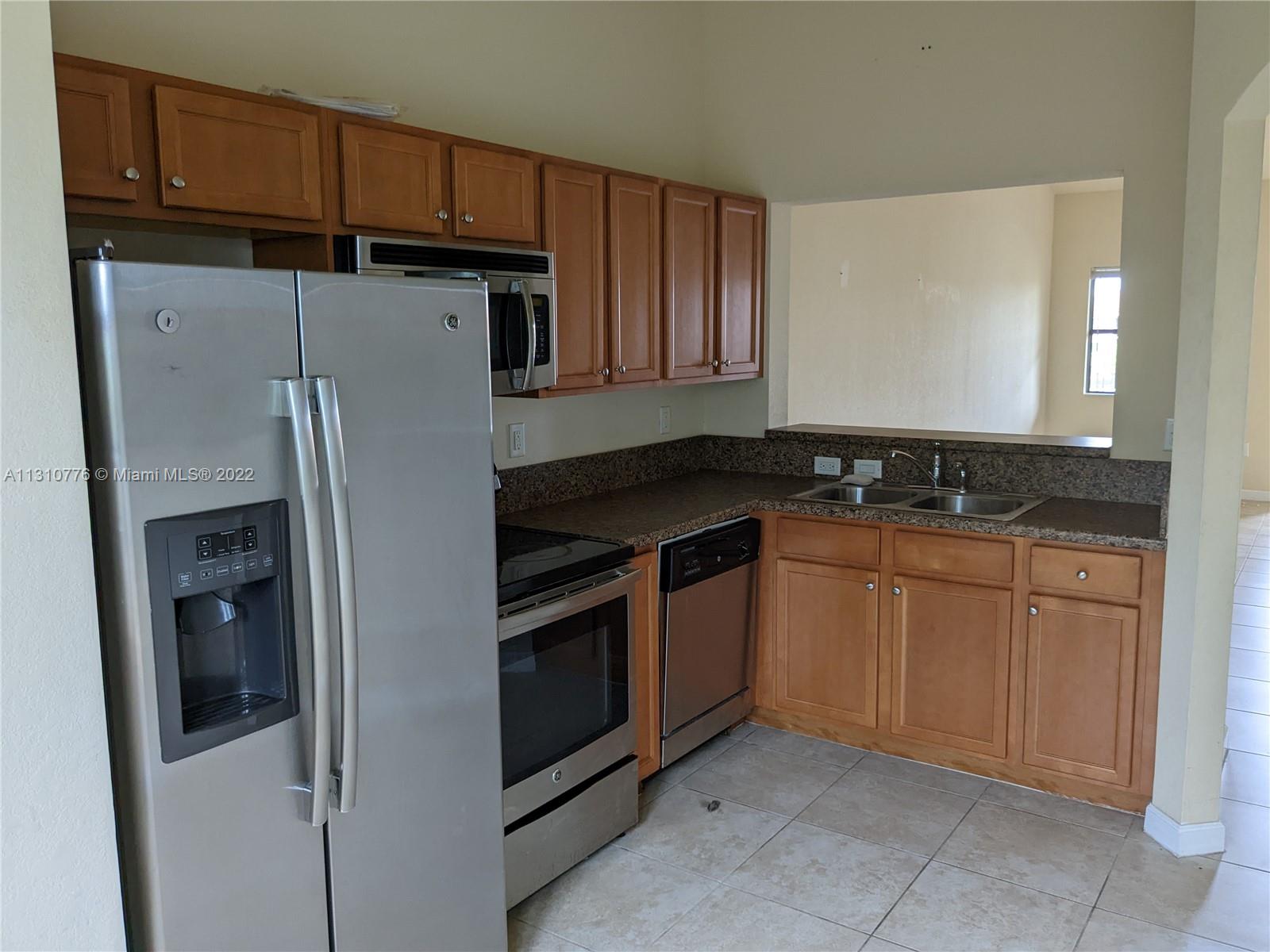 22441 SW 88th Pl Unit: 303-5