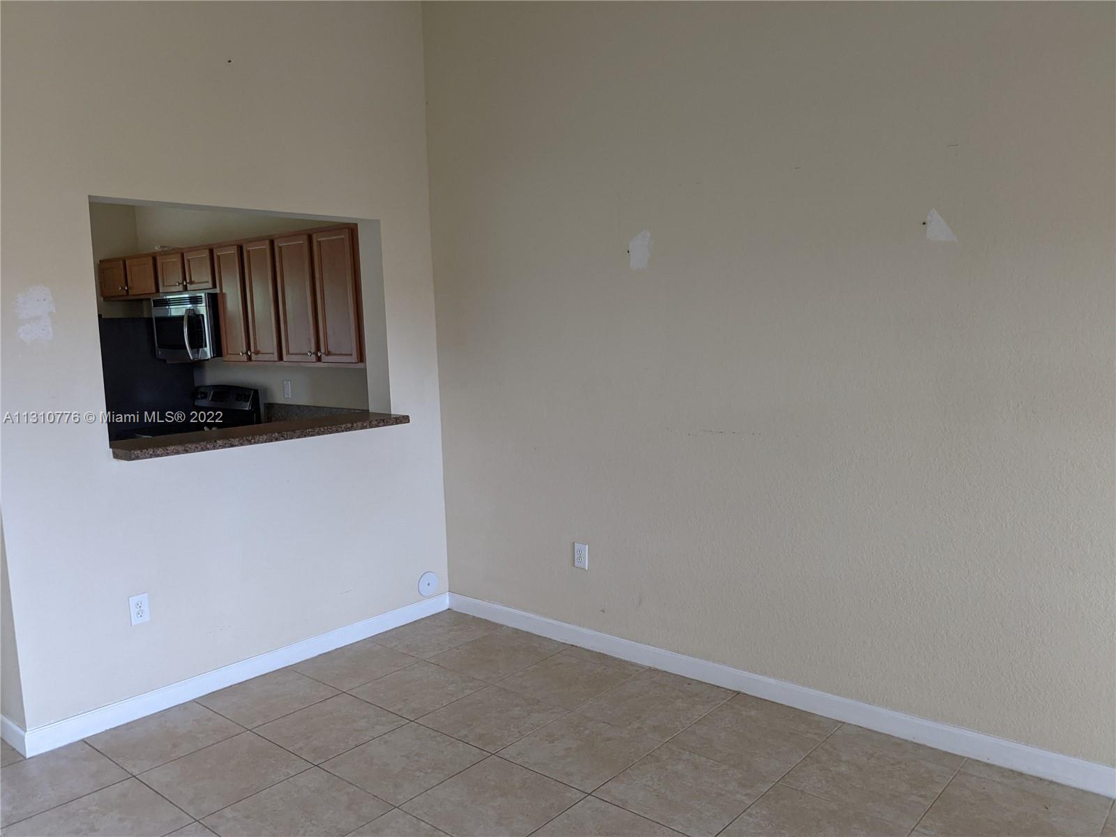 22441 SW 88th Pl Unit: 303-5