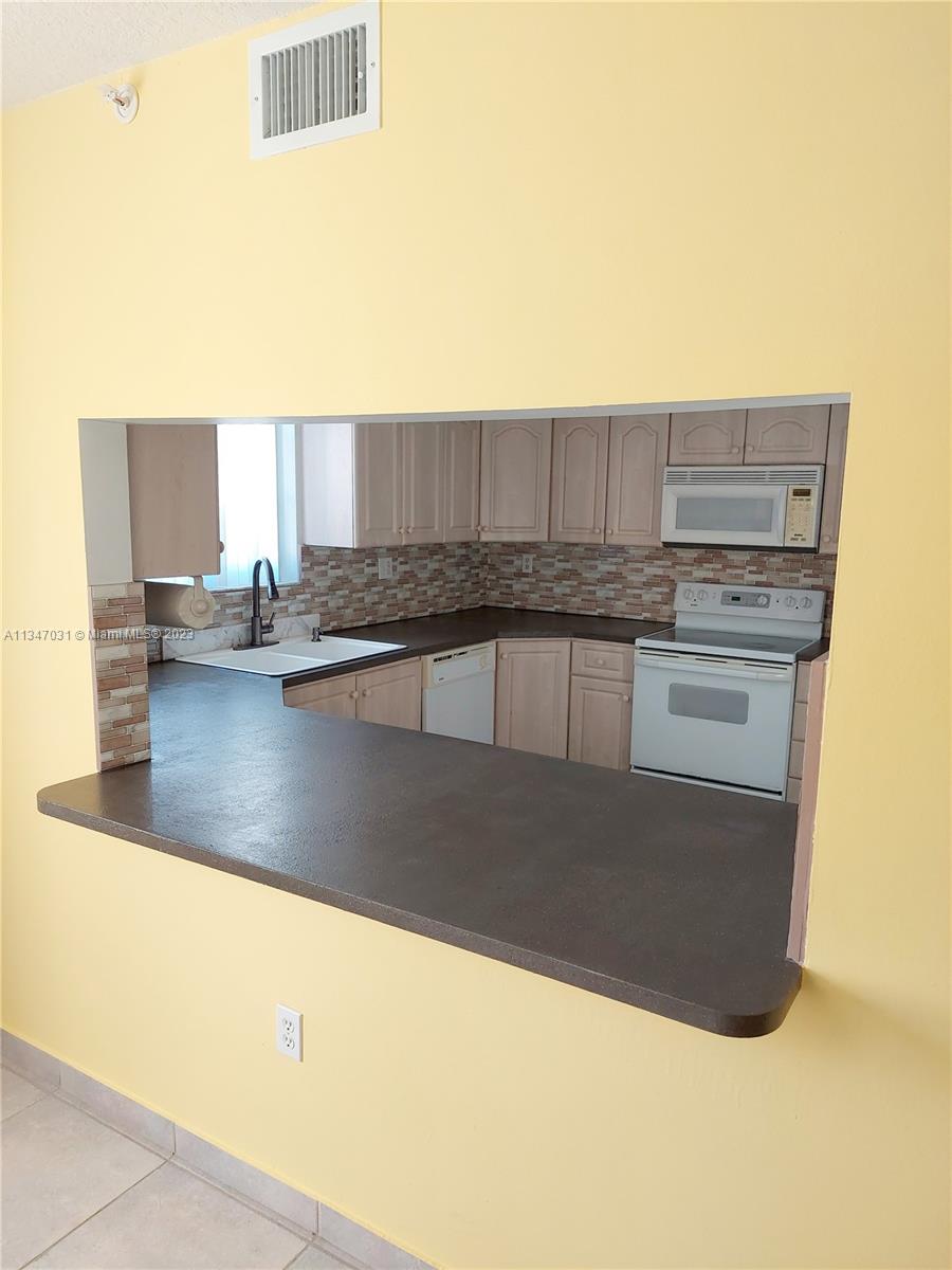 17455 NW 75th Pl Unit: 202