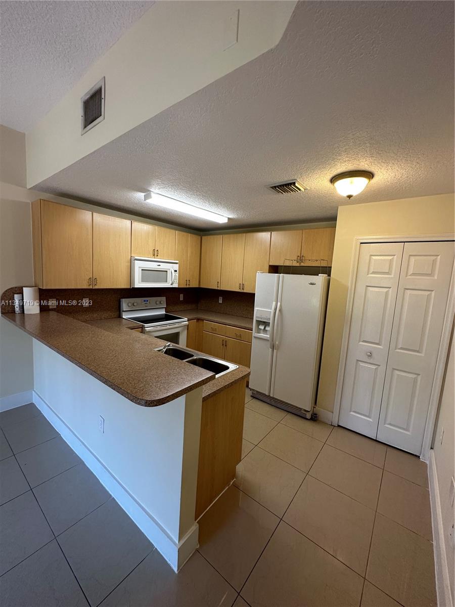 22811 SW 88th Pl Unit: 12-22