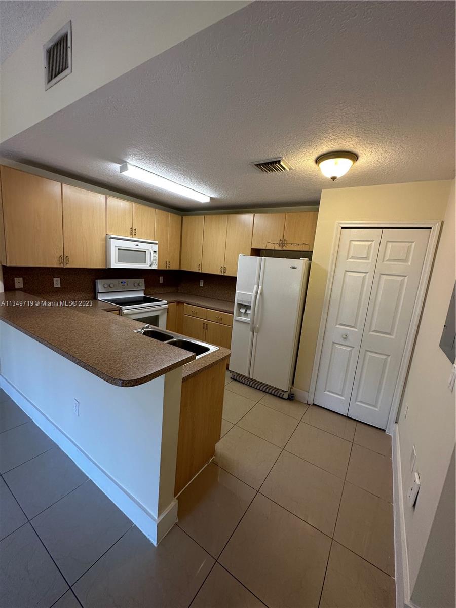 22811 SW 88th Pl Unit: 12-22
